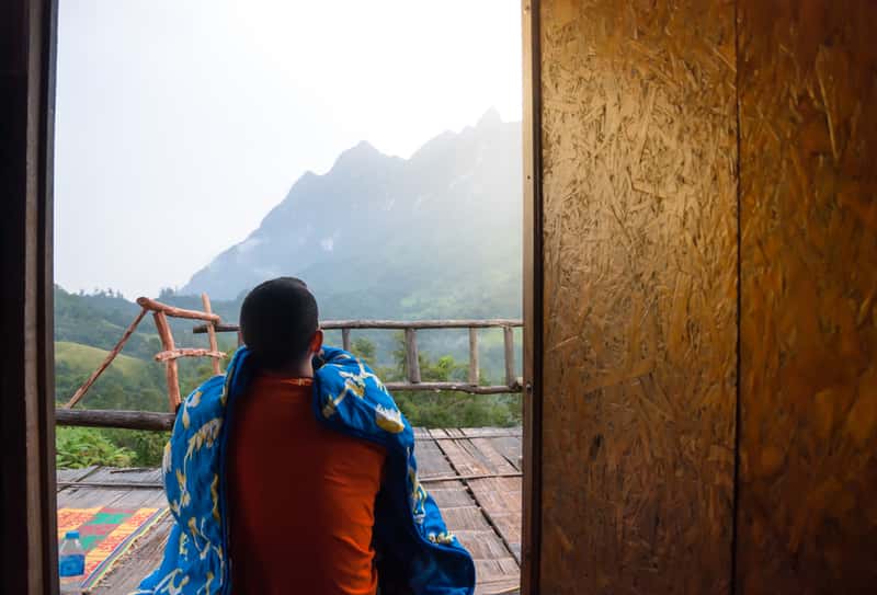 Traveler at a Guest House