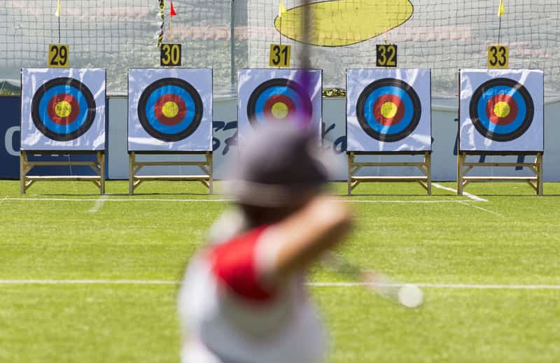 An archer takes his stance