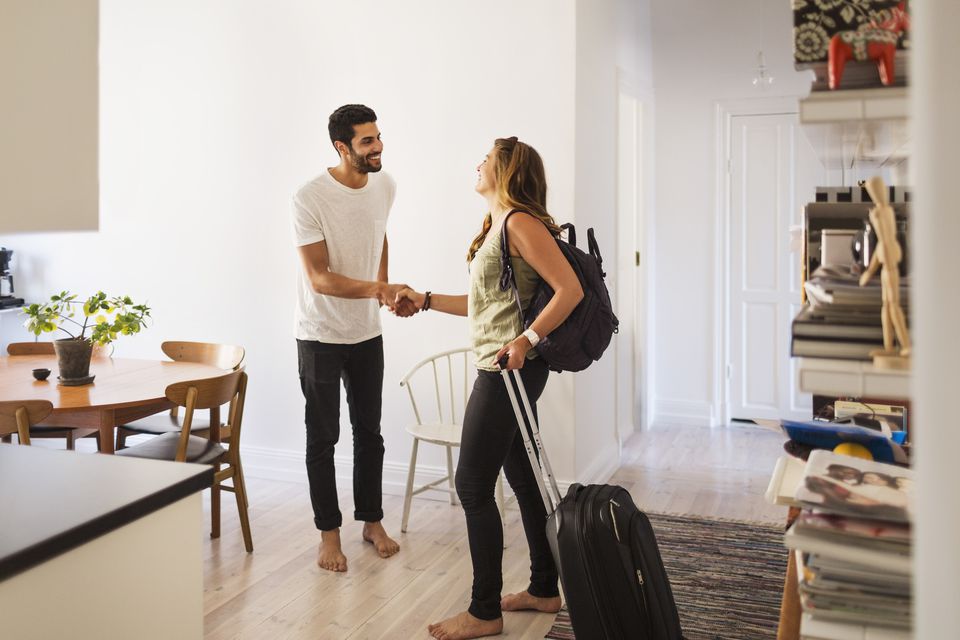 Try Couchsurfing - stay with a local
