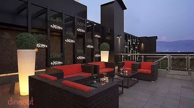 Enjoy the beautiful views with your partner at this rooftop eatery