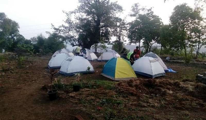 Enjoy camping in a forest at Tikona.