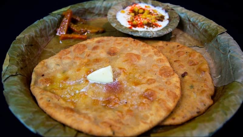 Paranthe, served with a dollop of butter