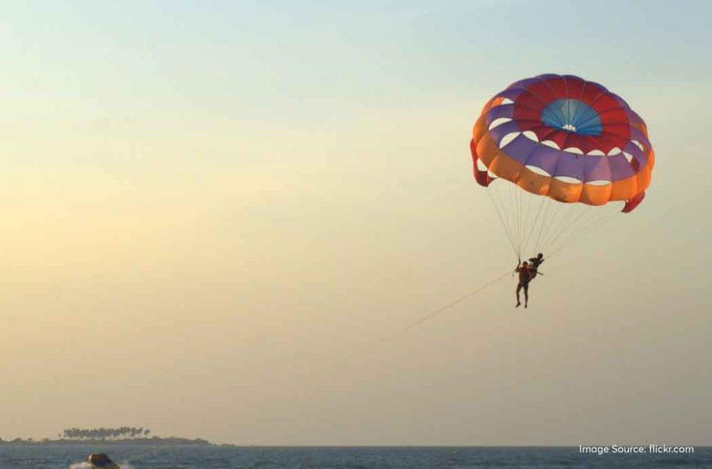 Enjoy parasailing at Malpe Beach while exploring the places to visit in Udupi.