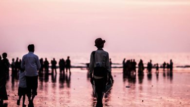 Visit Juhu Beach, a popular tourist attraction in Mumbai.